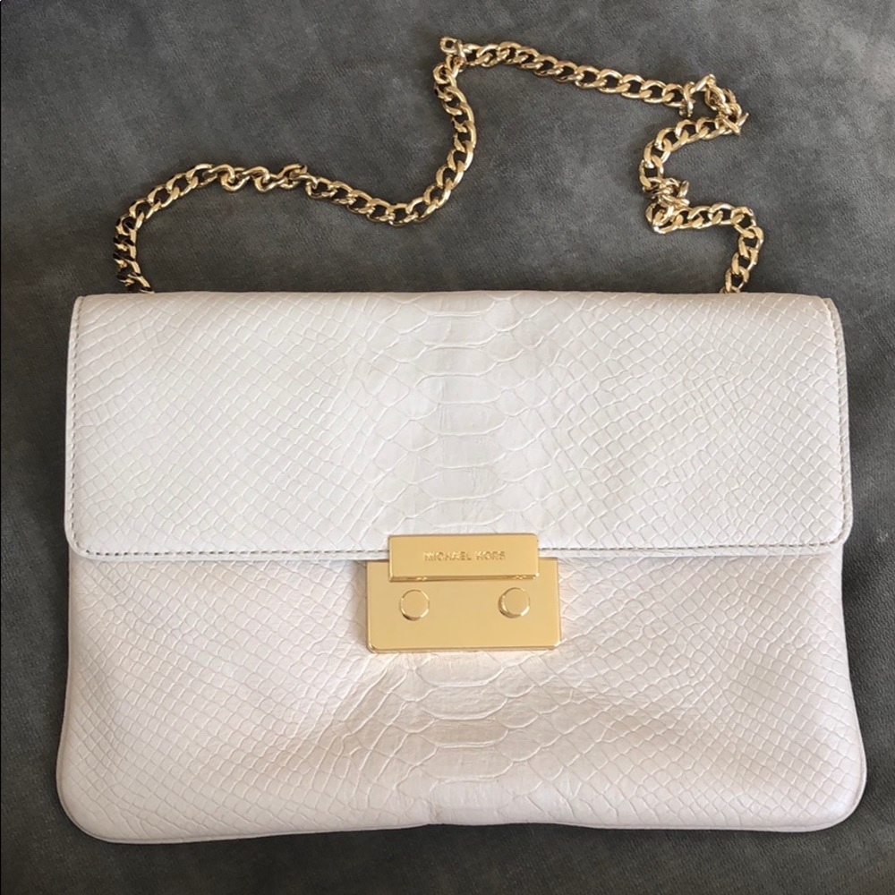 Michael Kors clutch. Never used!